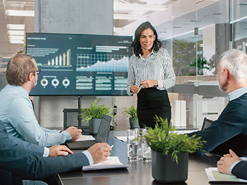 woman presenting at a meeting