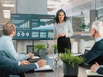 woman presenting at a meeting